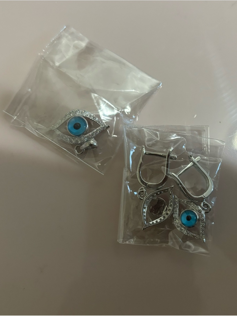 Silver Evil Eye Dangle Earrings with matching pendant